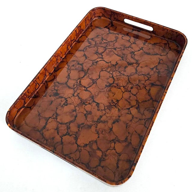 Offered is a sleek and chic 1970s/early 1980s Japanese lacquer tray in a faux tortoiseshell/burled wood design. It...