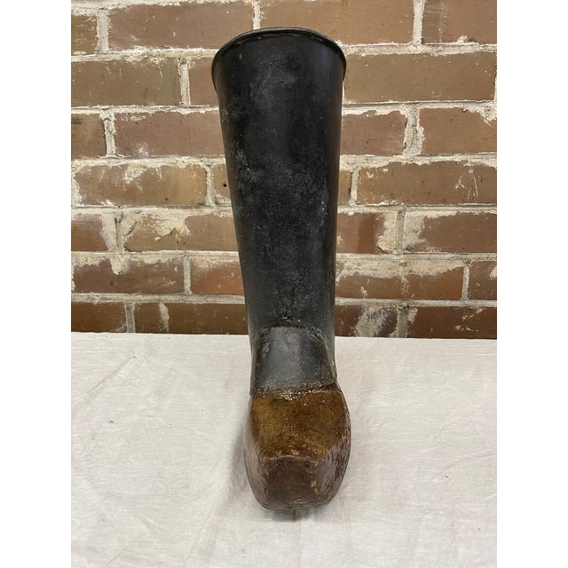 A 19th century Chinese rice paddy field boot. In the British retail trade history this type heavy, thick-soled boot is...