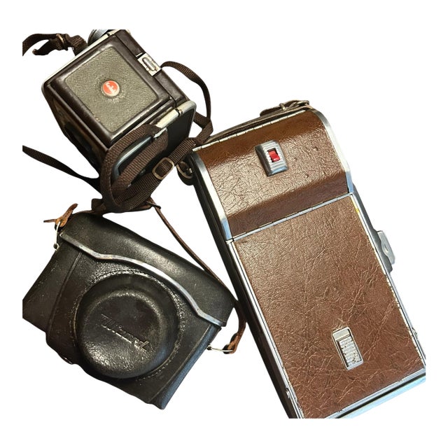 Vintage Decorative Camera Collection Circa Early 50s & 60s. Yashika 35 Mm With Wizards Lense & Original Case, Polaroid Land Camera, Kodak Duaflex IV For Sale