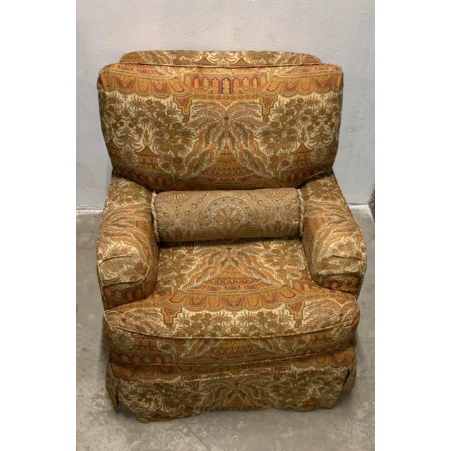 Vintage traditional armchair. The arms and and skirt are pleated in a regal heavy cotton fabric in shades of gold and...