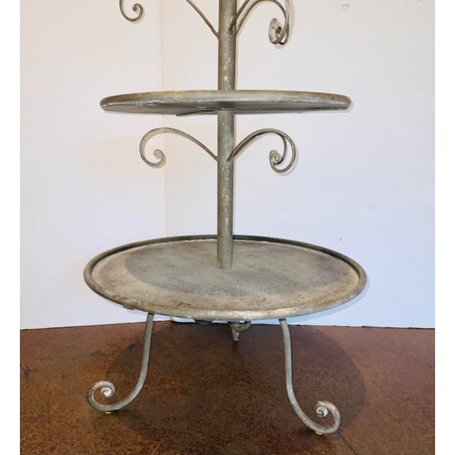 Stylish Transitional Silver Finished Large Two Tiered Iron Stand, showroom floor sample