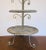 Stylish Transitional Silver Finished Large Two Tiered Iron Stand, showroom floor sample