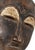 The Baule portrait mask discussed is intricately crafted for the Mblo dance, representing an honored person or ancestor in...