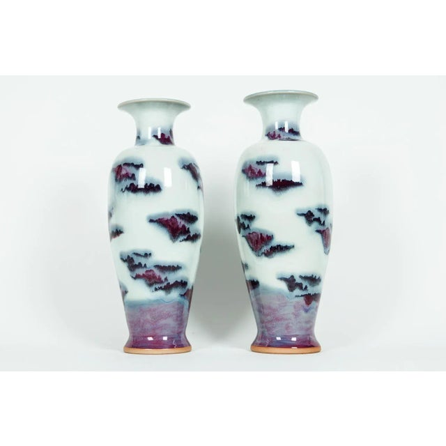 Mid-20th century glazed porcelain Asian pair of decorative vases / pieces. Each piece / vase is in excellent vintage...