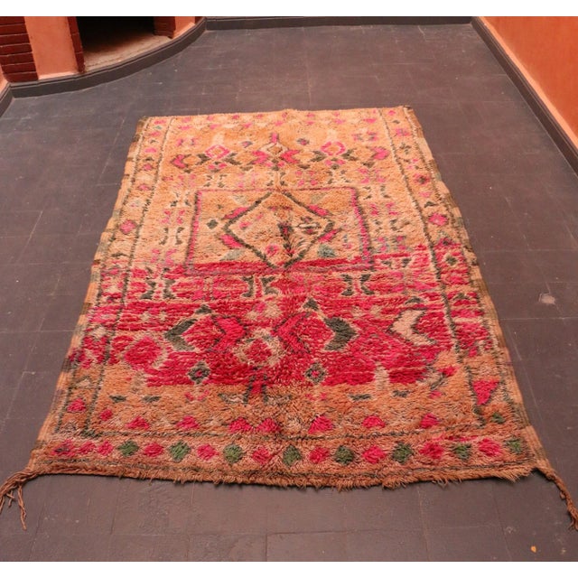 Boujad rugs are handwoven pile rugs from a small region in Haouz between the Middle Atlas and the Atlantic ocean. The...
