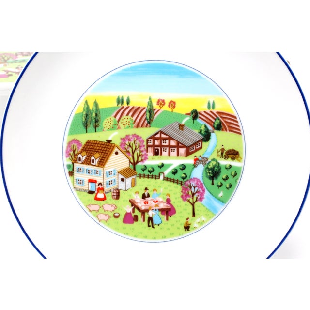 A rare set of 8 dessert plates and matching pedestal cake or pie plate, all with a colorful, printed countryside /...