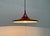 Simple pendulum from Staff glow after a design by Rolf Krüger. Here in a rare version in the color red. The shade shows a...