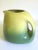 This rare vintage 1950's Mid Century Modern Tamac art pottery avocado green large handled ceramic pitcher is an incredibly...