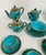 Polychrome porcelain tea and coffee service The service comprises 14 pieces: 8 coffee cups and saucers 1 coffee pot and 1...