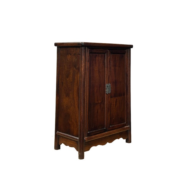 This small, Ming-style chest exudes a quiet elegance through its minimalist design and rich, warm wood tones. Crafted with...