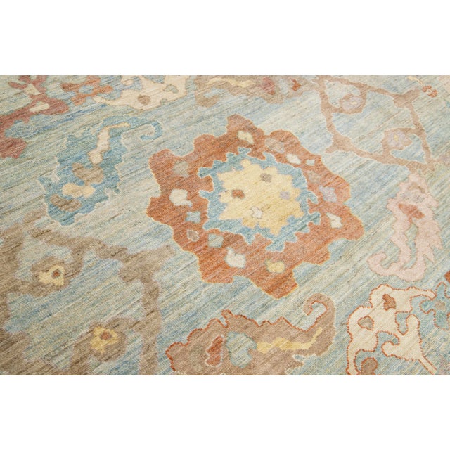 This modern reinterpretation of timeless Sultanabad design is beautifully manifested in an exquisitely hand-knotted wool...