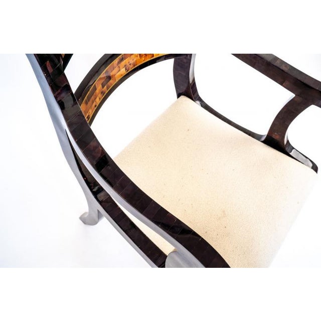 The Tessellated Horn Chair was designed for the Maitland Smith Company in the 1980's. It is executed in lacquered...