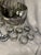 This vintage Dorothy Thorpe silver punch bowl set is a striking addition to any collection. Made of glass with a classic...