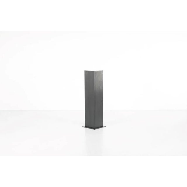 Secret Column Sellette model "La Secrète" in patinated steel. The interior shelves are mobile. Elegant and practical, the...