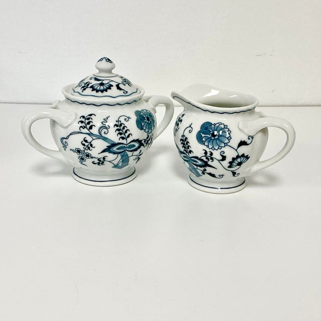 Vintage Home is pleased to present this Blue Danube Creamer and Covered Sugar Bowl from Japan. The vivid Meissen blue...