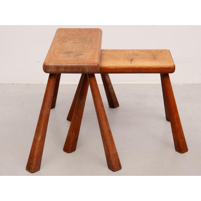 Set of two brutalist alpine solid wooden stools, sober design with a good stability. Can be used as a set of stools by a...