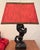 A striking and dramatic piece of classic Americana, this vintage 1950s ceramic table lamp features a beautifully sculpted...
