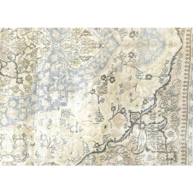 1920s Persian Meshed Rug. Hand woven in the Tabriz region of Northern Iran. Distressed and refinished in the U.S. The...