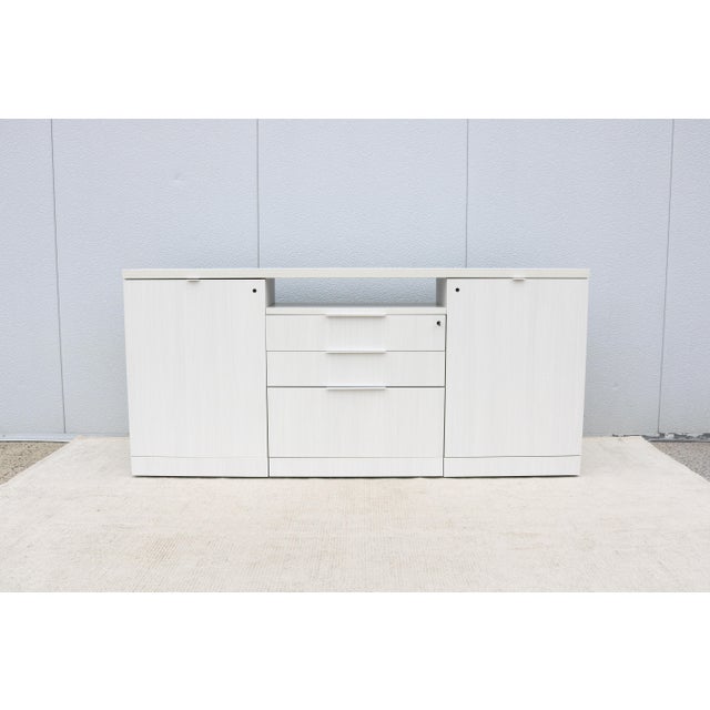 Fabulous modern minimalist style Reff Profiles classic credenza or sideboard in whitened ash laminates by Knoll. The Reff...