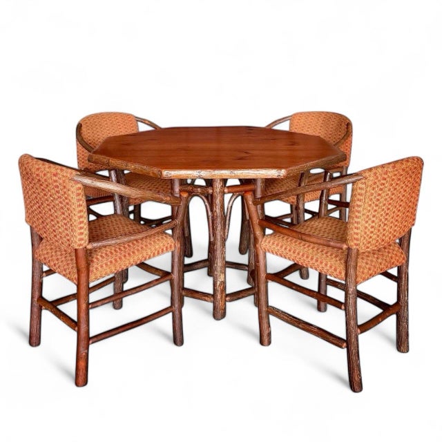 Nothing merges elegance with rustic style quite like the timeless aesthetic of Old Hickory furniture. The Hoop table and...