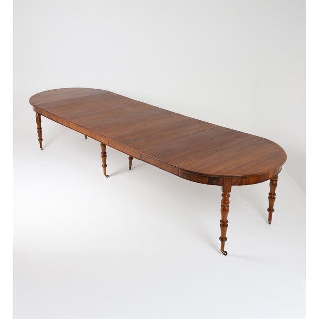 An outstanding example of mid-19th century French cabinetmaking , this remarkable extending dining tables combines...