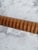 Vintage wood carved and copper candle snuffer. It has a etched and coiled design and looks Danish.