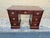 Vintage Victorian Style Mahogany Twin Pedestal Writing Desk. It features three drawers on each side with a central drawer...