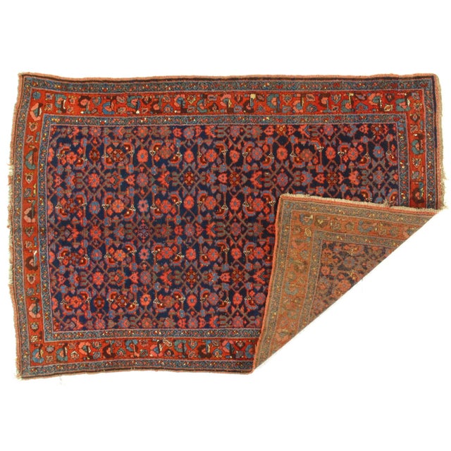 This is a fine antique Persian Bidjar that was made around 1880. The piece was handmade and hand-knotted from vegetable...