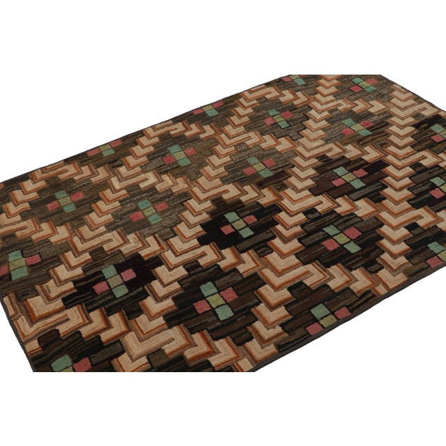 A rare 4x6 antique hooked rug of United States’ provenance, handmade in wool and fabric, circa 1920-1930, featuring...