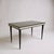 A striking mid-century Italian dining table by Umberto Mascagni, showcasing the glamorous blend of Space Age styling and...