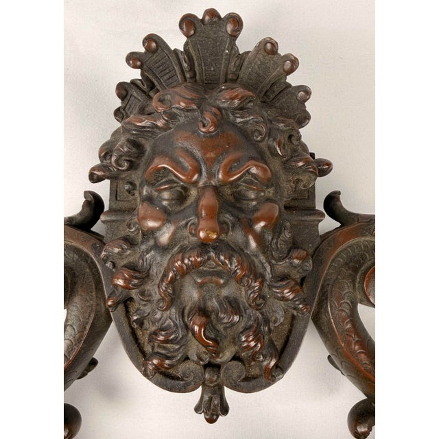 An impressive pair of monumental 19th-century French cast bronze door knockers by ST Bricard, Paris, executed in the...