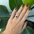 A beautifully crafted 14K gold ring featuring a vivid red‑pink rubellite tourmaline as its centerpiece (≈ 0.9 ct, round,...
