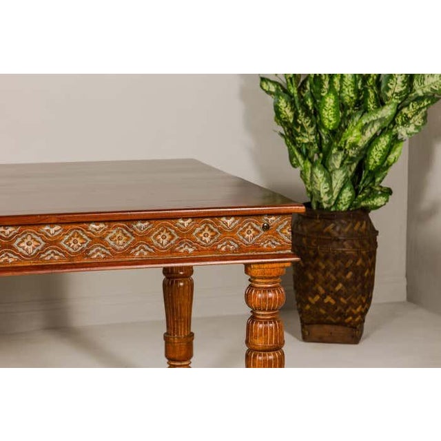 Brown Large Dining Room Table with Carved Apron, Floral Motifs and Turned Legs For Sale - Image 8 of 12