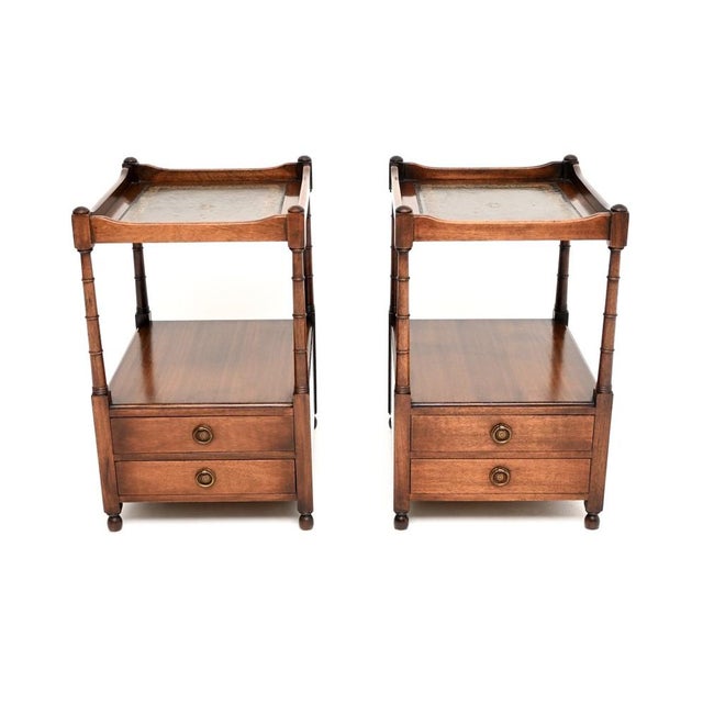 A lovely pair of antique leather top side tables. They were made in England, they date from around the 1930’s. The quality...