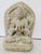 Beautifully handcarved limestone grey Carving of the Chenrazi Buddha. Four-armed and in the lotus position. Beautifully...