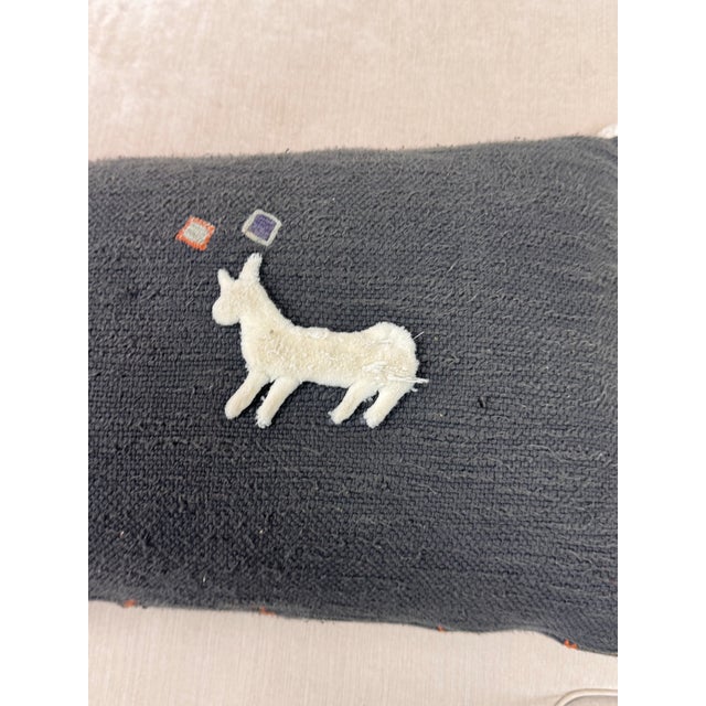 Design Plus Gallery presents a Heradia Lumbar Pillow from Anthropologie. The decorative elongated textile pillow...