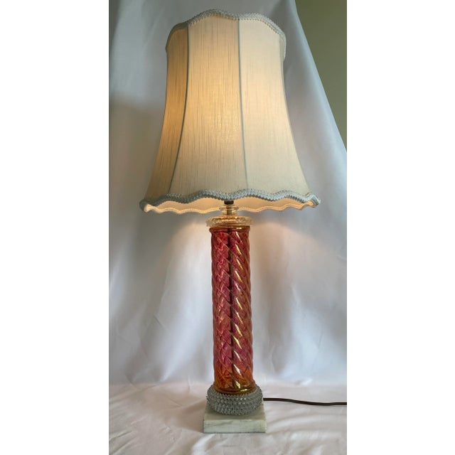 This Vintage Pink Iridescent Spiral Column and Clear Hobnail Glass Table Lamp With a Marble Base is an amazingly beautiful...