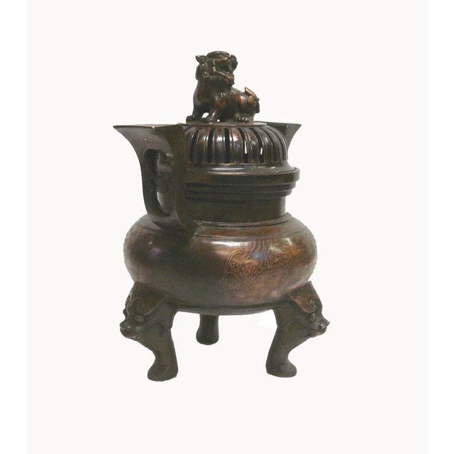 This is a nicely made metal incense burner with traditional Chinese style. It has a fine polish on the finish. The surface...