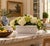 An elegant trompe l'oeil porcelain cachepot crafted in the form of a handwoven rope basket. Executed in glossy white...