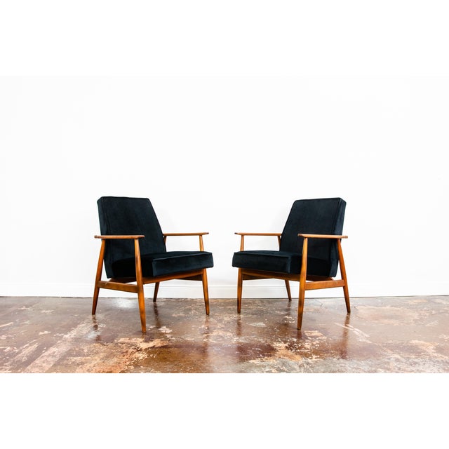 A pair of armchairs, model 300-190, designed by Henryk Lis in the 1960s, produced by the Dolnośląska Fabryka Mebli,...