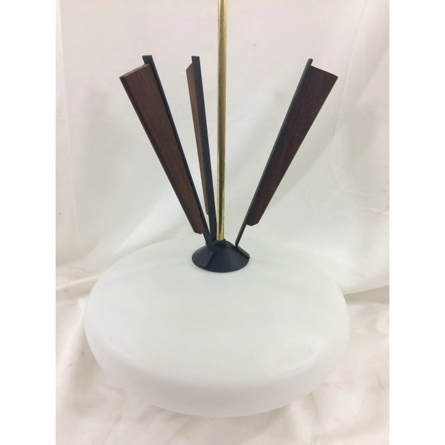 This funky French chandelier was teak accents on top! It would be a fantastic over a dining room or kitchen table. In...