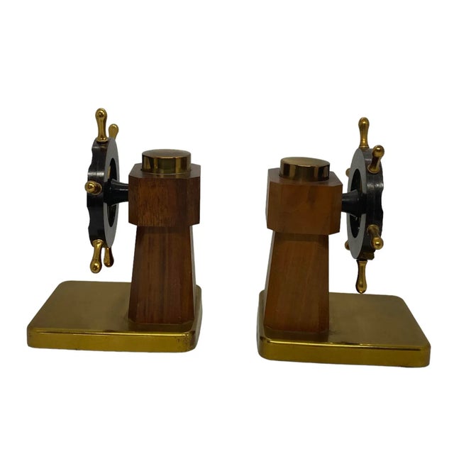 A very nice pair of Art Deco ship's wheel bookends by Walter Von Nessen for Chase & Co., circa 1930s. The bookends are...