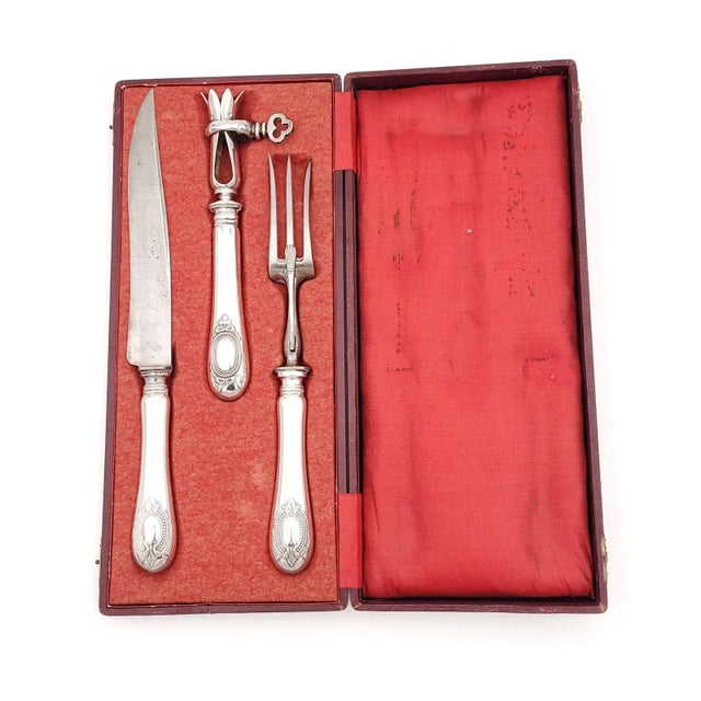A 19th-century French silver plated carving set, circa 1900. Listed measurements are of the box.