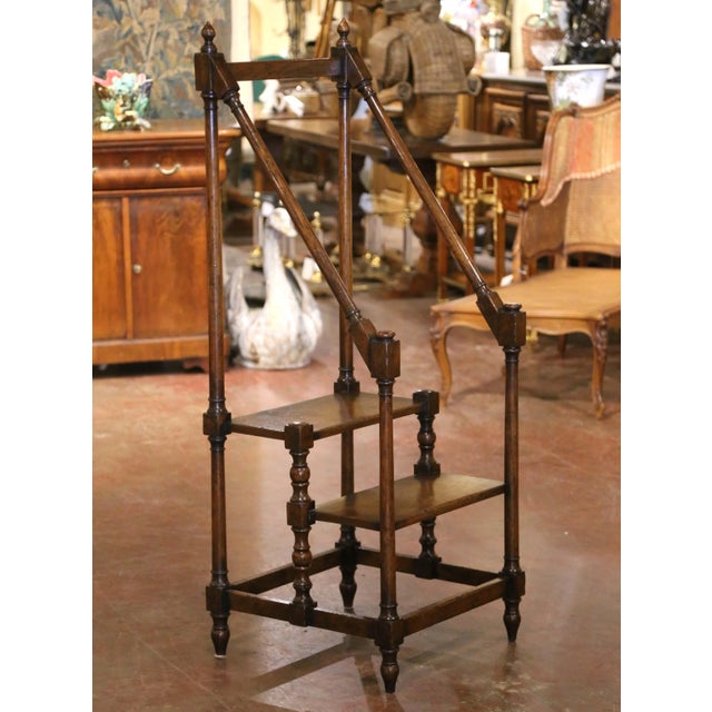Add warmth and practicality to a library, kitchen, or study with this handsome antique-style library step ladder. Crafted...