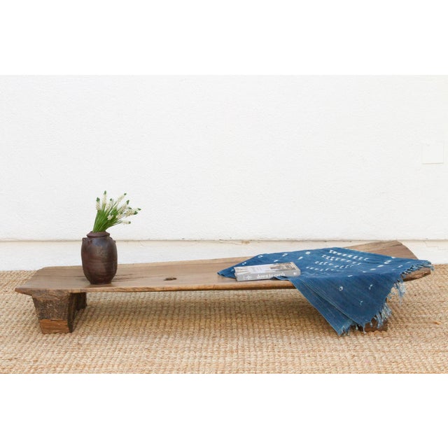 A unique addition to your home, this Senufo coffee table, crafted from a single log of wood, this antique Senufo table is...