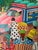 M. Bazile Haitian Folk Art Market Scene Oil on Masonite Board – Framed For Sale - Image 10 of 12