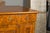 A French walnut buffet from the 19th century with burled accents, doors inlaid with diamond motifs and ogee bracket feet....