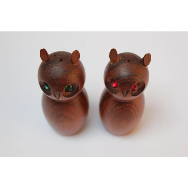 Danish Modern Teak Owl Salt and Pepper Shakers with Jeweled Eyes (one red, one green). Very good, vintage condition...