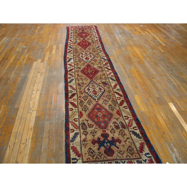 Antique Persian Serab rug, size: 2'8" x 14'2". Antique Serab Persian Brown 1890s Rug, Circa Date: 1890s. This exceptional...