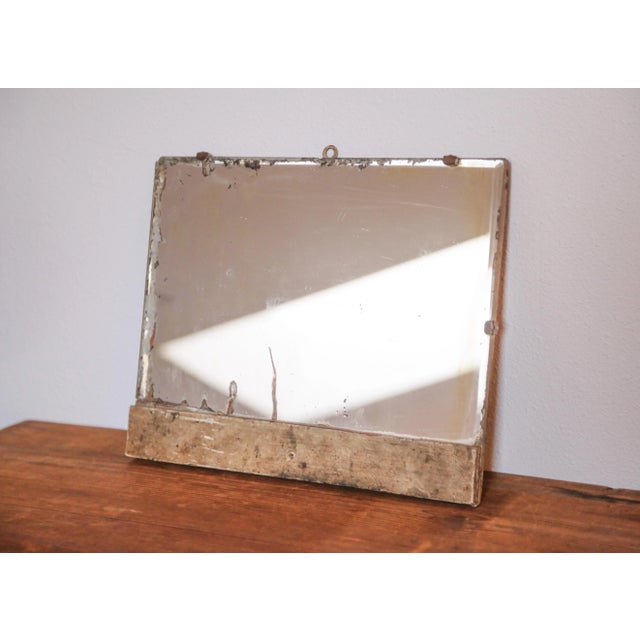 Small Primitive Vintage/Antique Mirror with unique patina and beveled edge with some old chips to the edge that add to the...